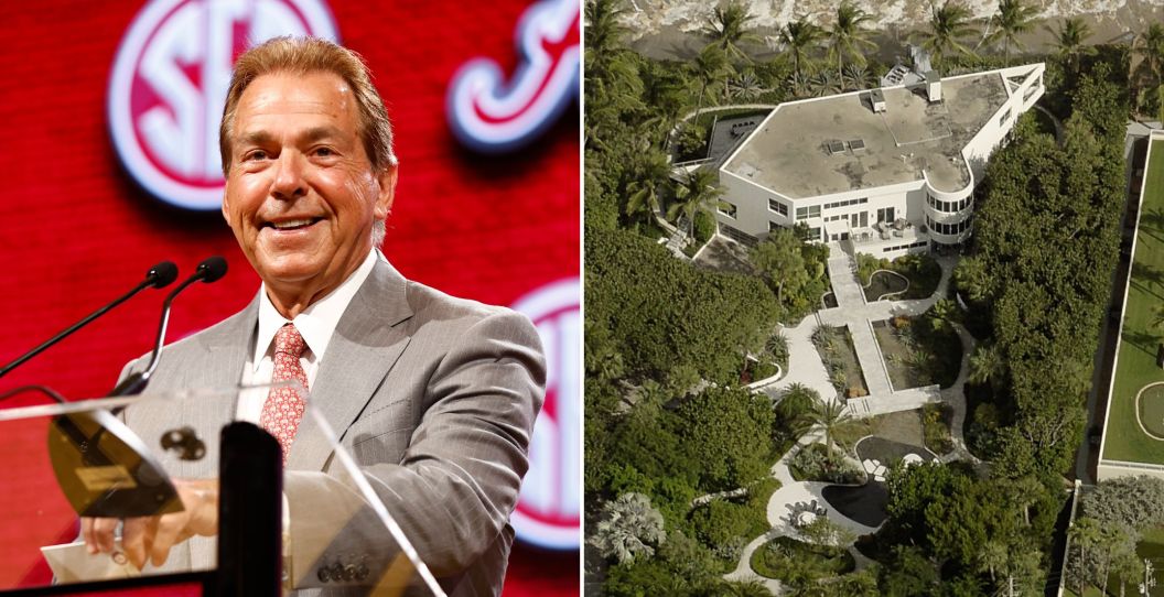 Nick Saban smiles next to a picture of his Florida house.