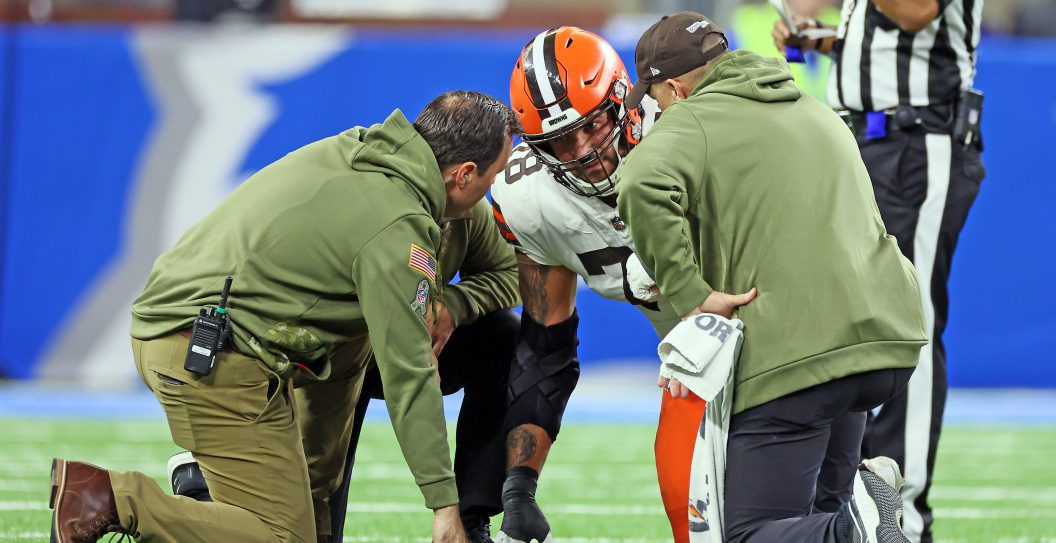 Cleveland Browns offensive tackle Jack Conklin (78) is checked for injury during an NFL football game between the Buffalo Bills and the Cleveland Browns in Detroit, Michigan USA, on Sunday, November 20, 2022.
