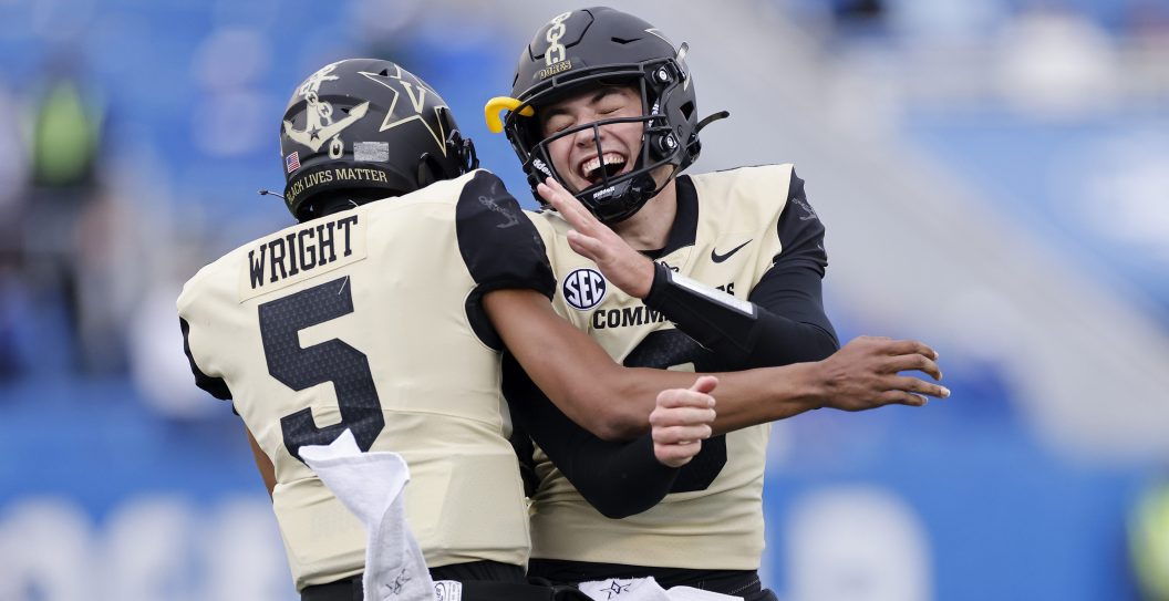 LEXINGTON, KY - NOVEMBER 14: Ken Seals #8 and Mike Wright #5 of the Vanderbilt Commodores celebrate after a touchdown against the Kentucky Wildcats in the second quarter of the game at Kroger Field on November 14, 2020 in Lexington, Kentucky.