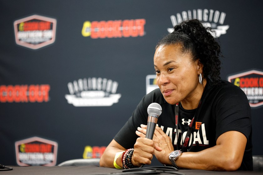 Dawn Staley speaks to reporters.
