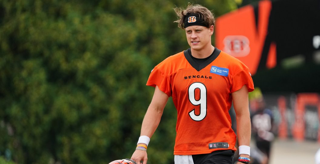 CINCINNATI, OHIO - JULY 26: Joe Burrow #9 of the Cincinnati Bengals walks to the field during training camp at Kettering Health Practice Fields on July 26, 2023 in Cincinnati, Ohio.