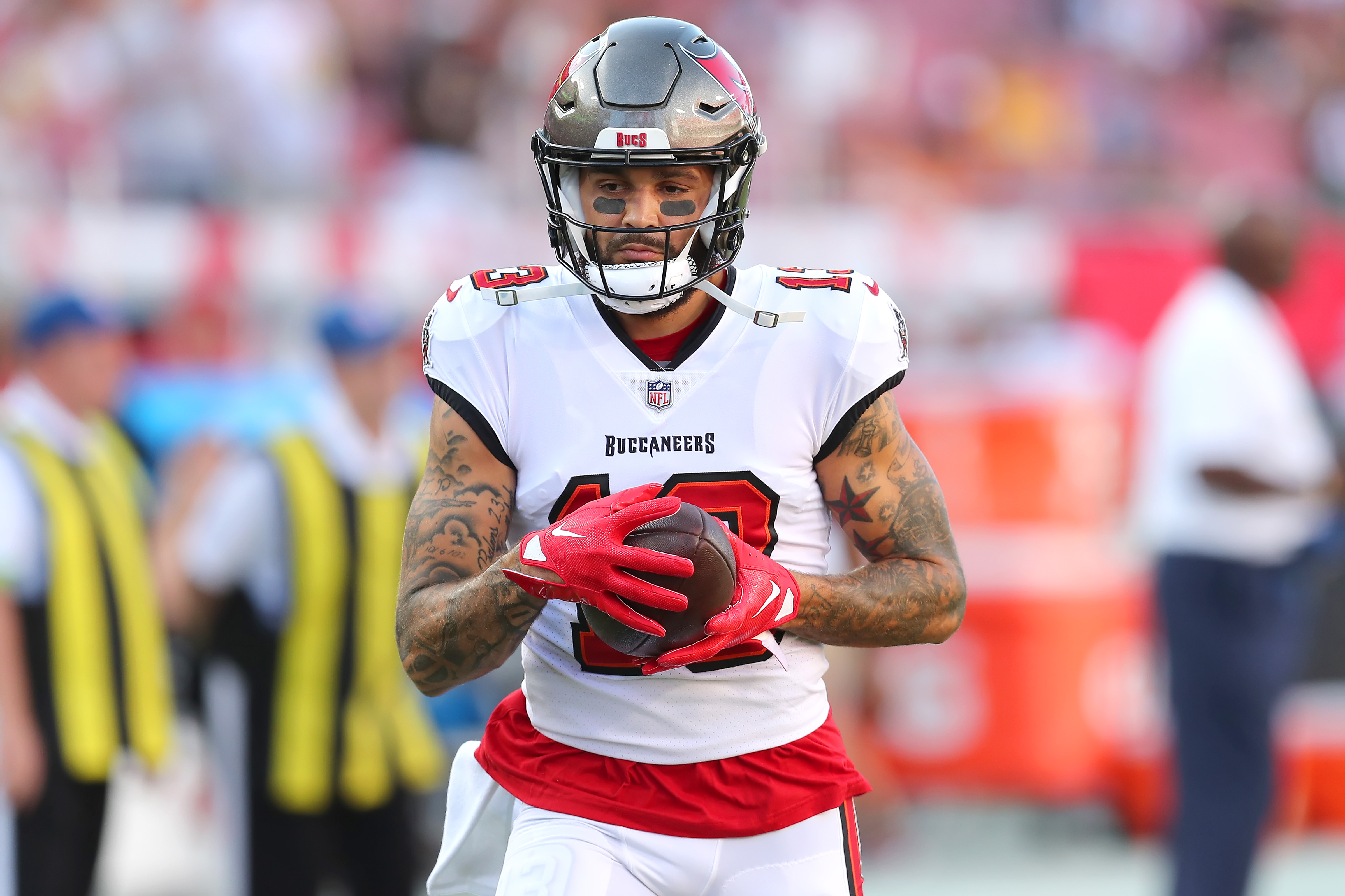TAMPA, FL - AUGUST 11: Tampa Bay Buccaneers Wide Receiver Mike Evans (13) warms up before the preseason game between the Pittsburgh Steelers and the Tampa Bay Buccaneers on August 11, 2023 at Raymond James Stadium in Tampa.