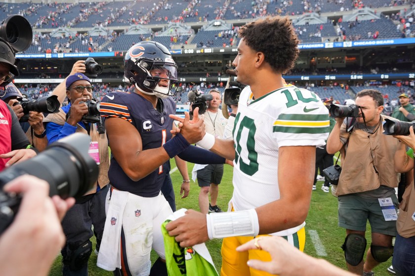 CHICAGO, IL - SEPTEMBER 10: Quarterback Justin Fields #1 of the Chicago Bears embraces Quarterback Jordan Love #10 of the Green Bay Packers after an NFL football game at Soldier Field on September 10, 2023 in Chicago, Illinois. 