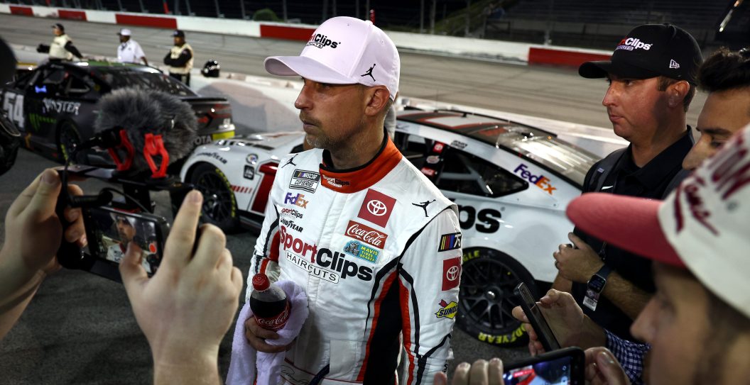 DARLINGTON, SOUTH CAROLINA - SEPTEMBER 03: Denny Hamlin, driver of the #11 Sport Clips Haircuts Toyota, speaks to the media after the NASCAR Cup Series Cook Out Southern 500 at Darlington Raceway on September 03, 2023 in Darlington, South Carolina.