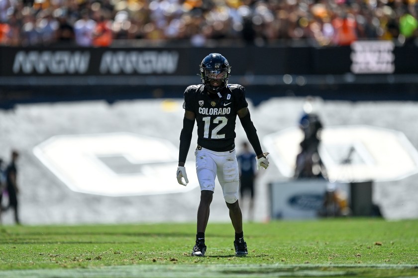 Travis Hunter stands on the field for Colorado.
