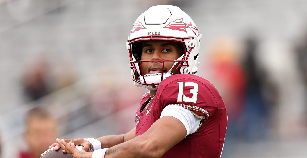CHESTNUT HILL, MASSACHUSETTS - SEPTEMBER 16: Jordan Travis #13 of the Florida State Seminoles warms up before the game between the Florida State Seminoles and the Boston College Eagles at Alumni Stadium on September 16, 2023 in Chestnut Hill, Massachusetts.