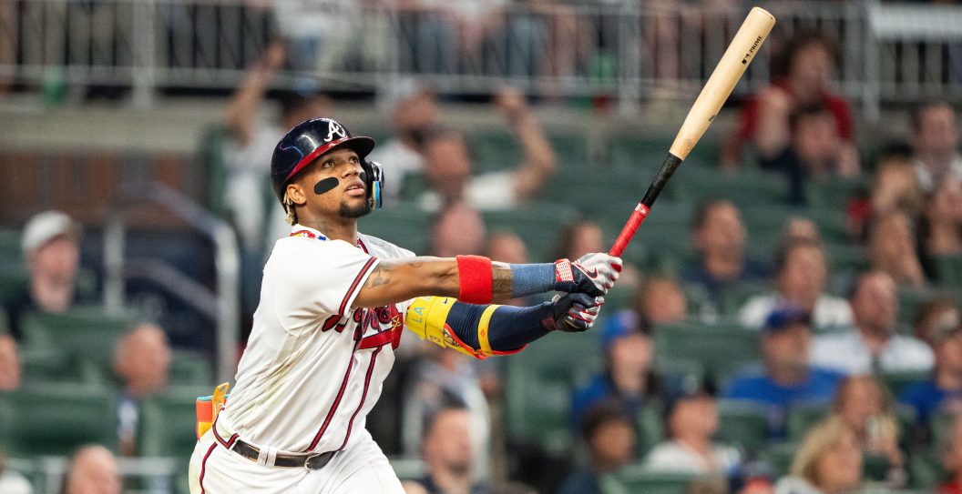 ATLANTA, GA - SEPTEMBER 26: Ronald Acuna Jr. #13 of the Atlanta Braves hits a home run during the seventh inning against the Chicago Cubs at Truist Park on September 26, 2023 in Atlanta, Georgia.