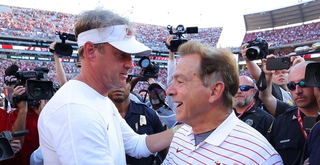 TUSCALOOSA, ALABAMA - SEPTEMBER 23: Head coach Nick Saban of the Alabama Crimson Tide converses with head coach Lane Kiffin of the Mississippi Rebels after their 24-10 win at Bryant-Denny Stadium on September 23, 2023 in Tuscaloosa, Alabama.