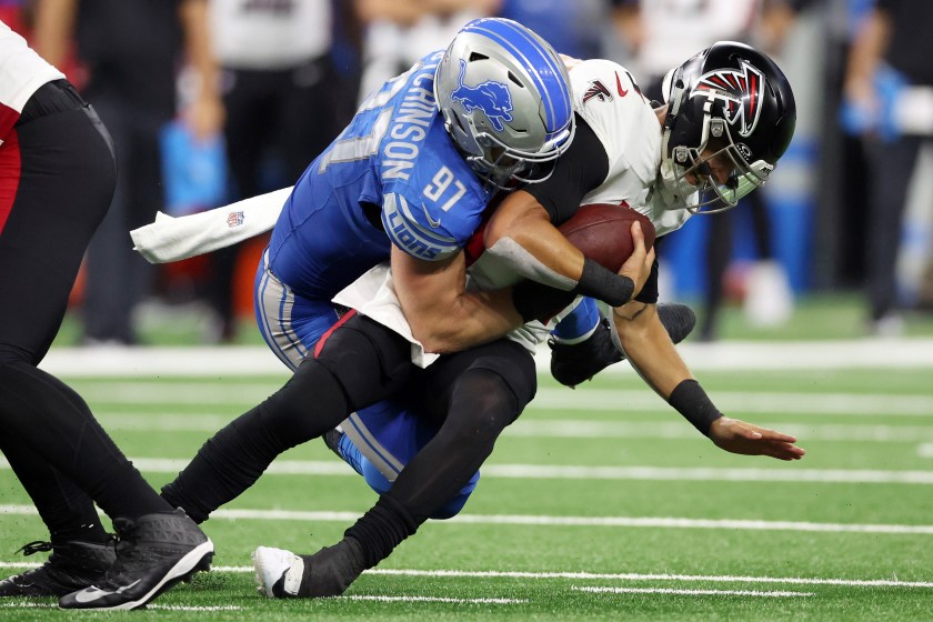 DETROIT, MICHIGAN - SEPTEMBER 24: Aidan Hutchinson #97 of the Detroit Lions sacks Desmond Ridder #9 of the Atlanta Falcons in the fourth quarter at Ford Field on September 24, 2023 in Detroit, Michigan. 