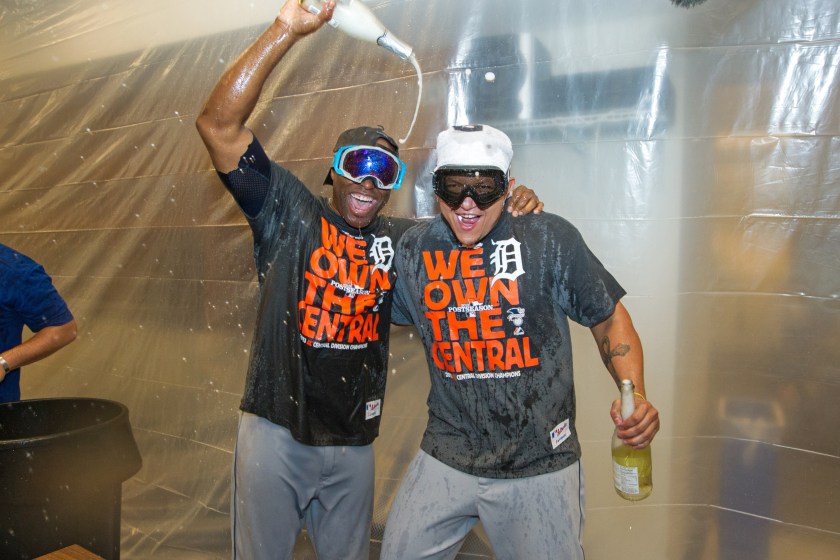 Miguel Cabrera and Torii Hunter celebrate winning the division.