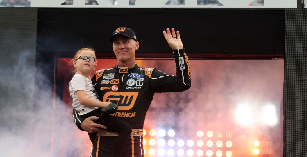 Kevin Harvick waves to the crowd.
