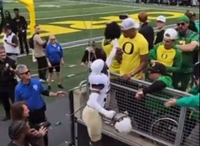 Colorado player's altercation with Oregon fans.