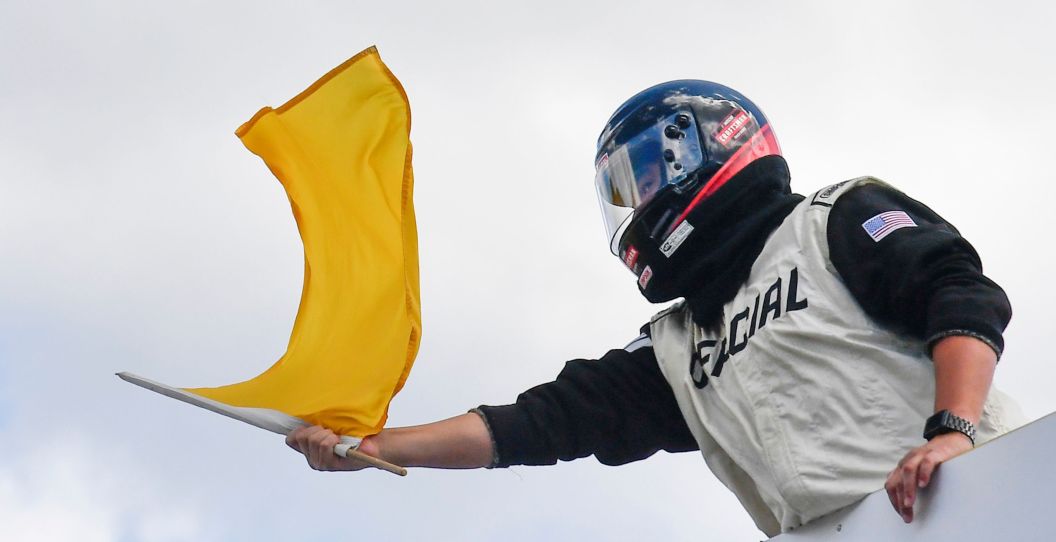 A yellow flag flies at NASCAR.