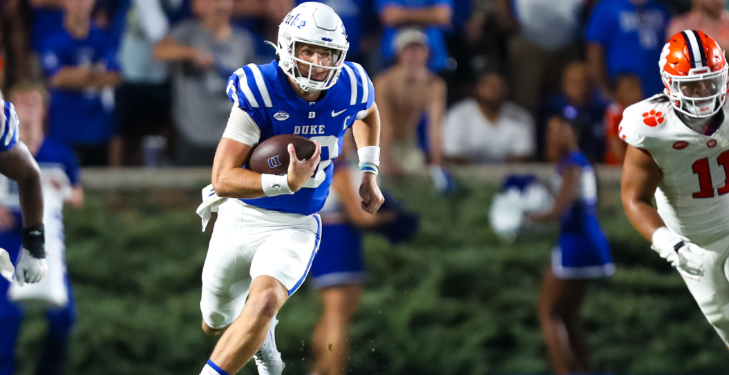 DURHAM, NC - SEPTEMBER 04: Riley Leonard #13 of the Duke Blue Devils runs the ball during a football game against the Clemson Tigers at Wallace Wade Stadium in Durham, North Carolina on Sep 4, 2023.