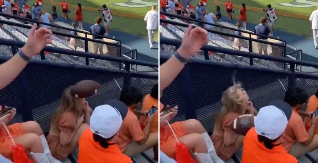 An Auburn fan is hit in the face with a field goal.