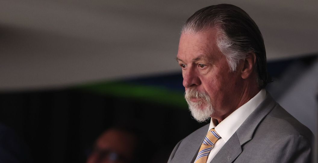 Barry Melrose looks on during an NHL game in 2022.