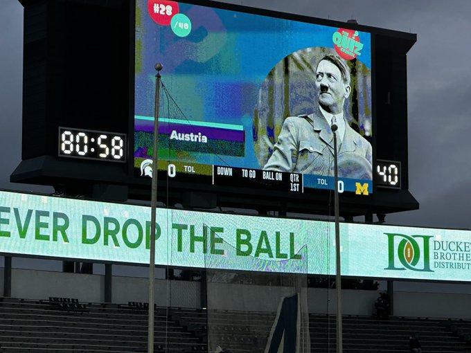 Michigan State displayed a picture of Hitler on their scoreboard.