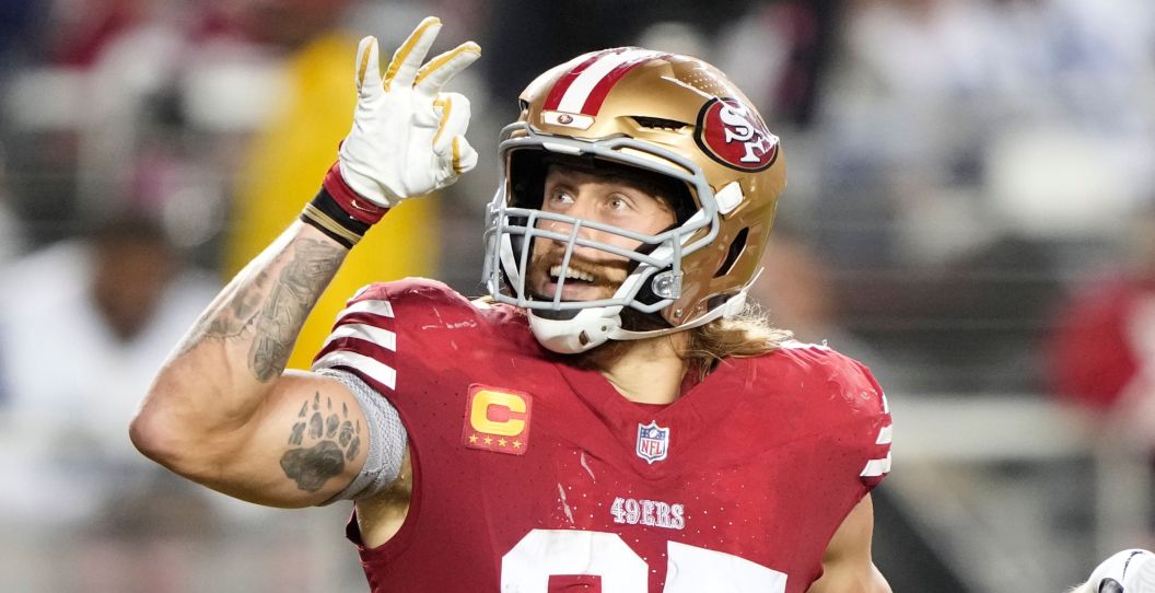 George Kittle puts three fingers in the air.