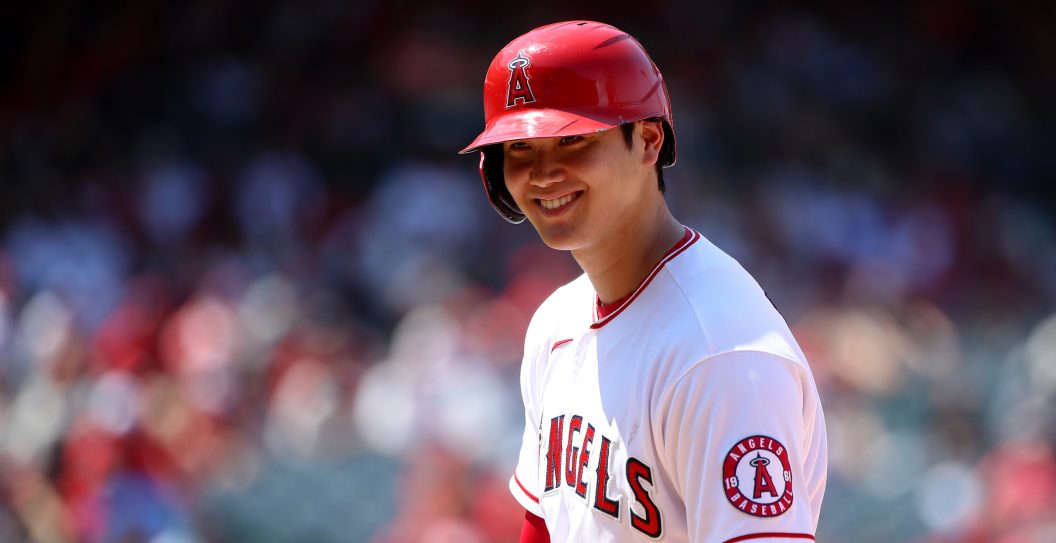 ANAHEIM, CALIFORNIA - JULY 18: Shohei Ohtani #17 of the Los Angeles Angels looks on from first base during the fifth inning against the Seattle Mariners at Angel Stadium of Anaheim on July 18, 2021 in Anaheim, California.