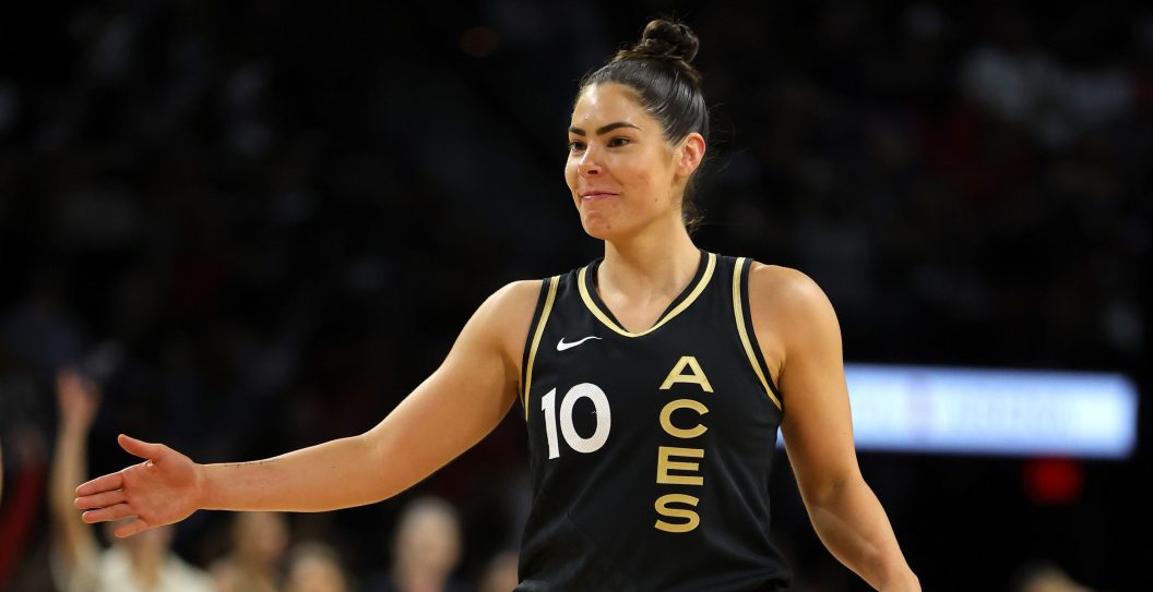 LAS VEGAS, NEVADA - AUGUST 20: Kelsey Plum #10 of the Las Vegas Aces smiles after scoring off a teammates' missed free throw against the Phoenix Mercury in the second quarter of Game Two of the 2022 WNBA Playoffs first round at Michelob ULTRA Arena on August 20, 2022 in Las Vegas, Nevada. The Aces defeated the Mercury 117-80 to win the series. NOTE TO USER: User expressly acknowledges and agrees that, by downloading and or using this photograph, User is consenting to the terms and conditions of the Getty Images License Agreement.