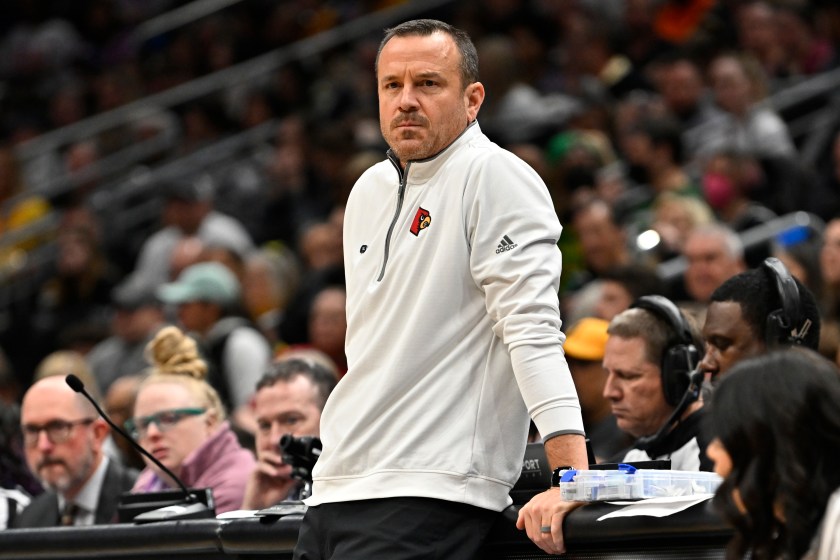 SEATTLE, WASHINGTON - MARCH 26: Head coach Jeff Walz of the Louisville Cardinals looks on during the third quarter against the Iowa Hawkeyes in the Elite Eight round of the NCAA Women's Basketball Tournament at Climate Pledge Arena on March 26, 2023 in Seattle, Washington. 