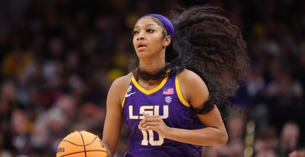 DALLAS, TX - APRIL 02: Angel Reese #10 of the LSU Lady Tigers handles the ball against the Iowa Hawkeyes during the 2023 NCAA Women's Basketball Tournament National Championship at American Airlines Center on April 2, 2023 in Dallas, Texas.