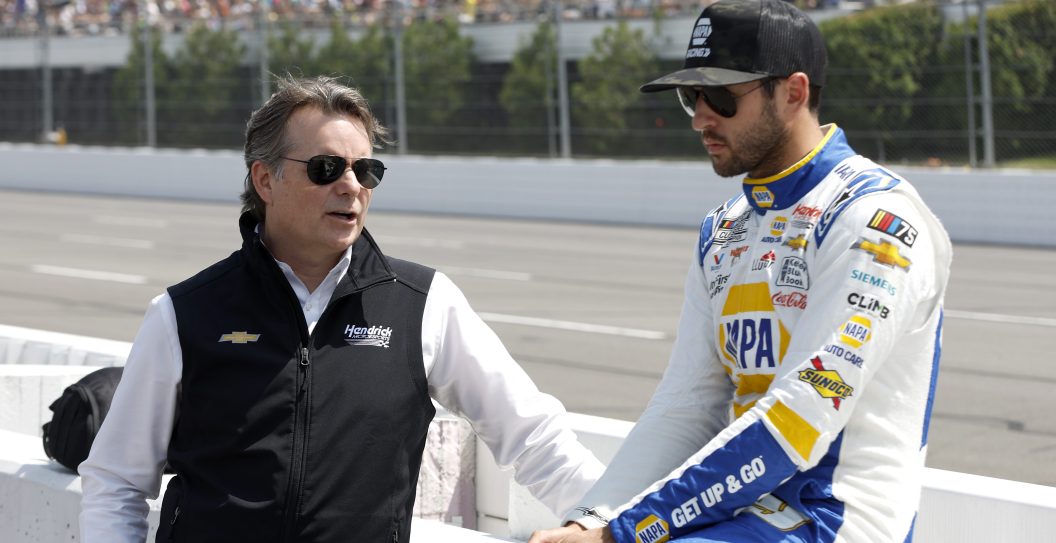 LONG POND, PENNSYLVANIA - JULY 23: Jeff Gordon, Vice Chairman of Hendrick Motorsports (L) and Chase Elliott, driver of the #9 NAPA Auto Parts Chevrolet, talk on the grid prior to the NASCAR Cup Series HighPoint.com 400 at Pocono Raceway on July 23, 2023 in Long Pond, Pennsylvania.