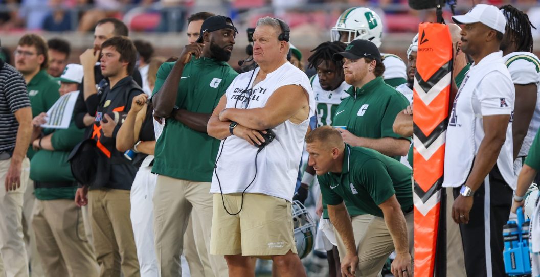 DALLAS, TX - SEPTEMBER 30: Charlotte 49ers head coach Biff Poggi looks on from the sideline during the game between the SMU Mustangs and the Charlotte 49ers on September 30, 2023 at Gerald J. Ford Stadium in Dallas, TX.