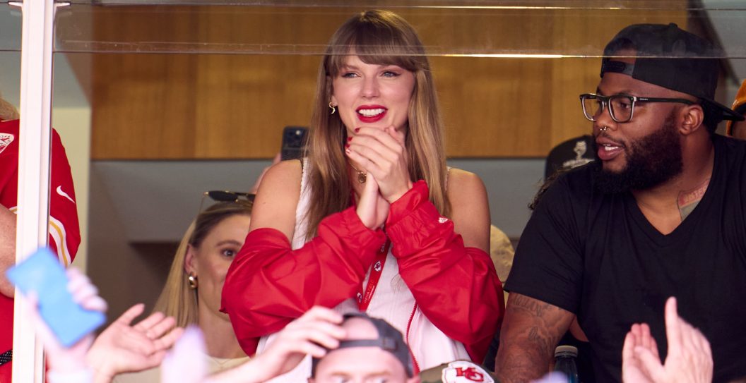 KANSAS CITY, MO - SEPTEMBER 24: Taylor Swift cheers from a suite as the Kansas City Chiefs play the Chicago Bears at GEHA Field at Arrowhead Stadium on September 24, 2023 in Kansas City, Missouri.