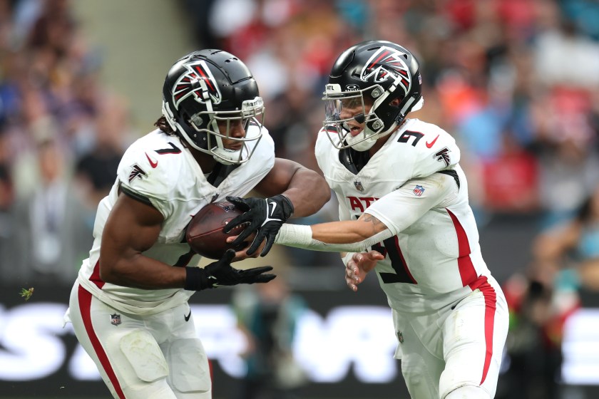 Atlanta Falcons Desmond Ridder (right) hands the ball off to Bijan Robinson during the NFL International match at Wembley Stadium, London. Picture date: Sunday October 1, 2023. 