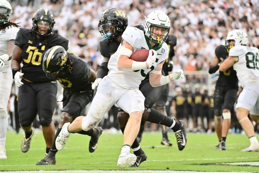 Baylor's Dawson Pendergrass runs with the ball against UCF.
