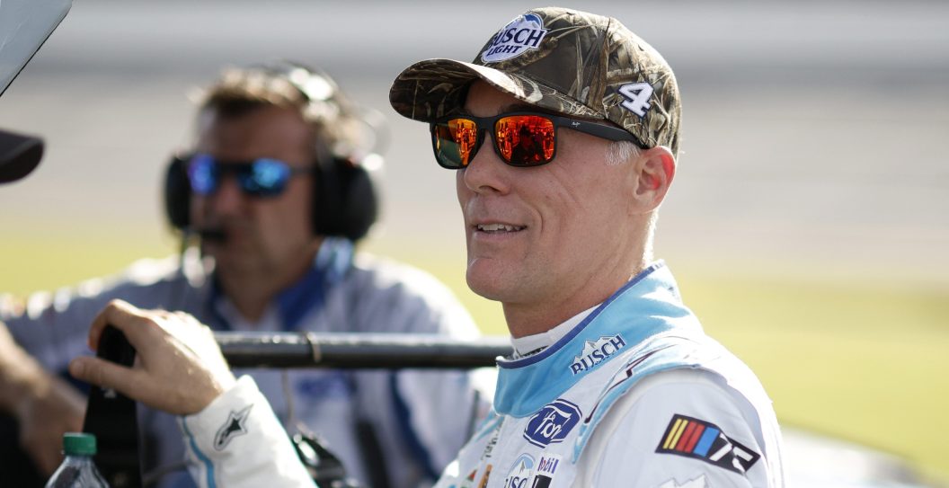 TALLADEGA, ALABAMA - SEPTEMBER 30: Kevin Harvick, driver of the #4 Busch Light Camo Ford, looks on during qualifying for the NASCAR Cup Series YellaWood 500 at Talladega Superspeedway on September 30, 2023 in Talladega, Alabama.