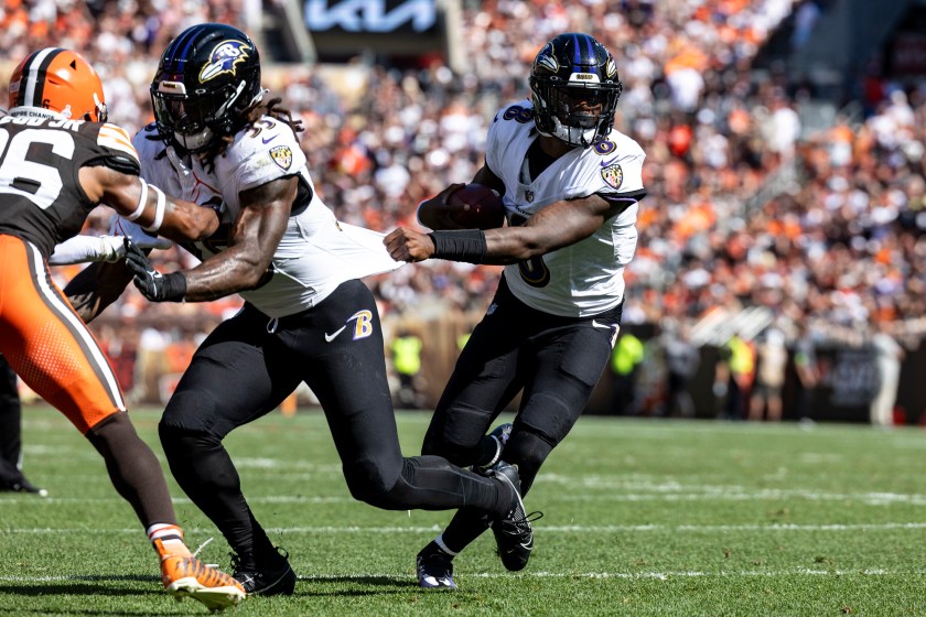 CLEVELAND, OHIO - OCTOBER 01: Lamar Jackson #8 of the Baltimore Ravens runs the ball during the game against the Cleveland Browns at Cleveland Browns Stadium on October 1, 2023 in Cleveland, Ohio. The Ravens beat the Browns 28-3. 