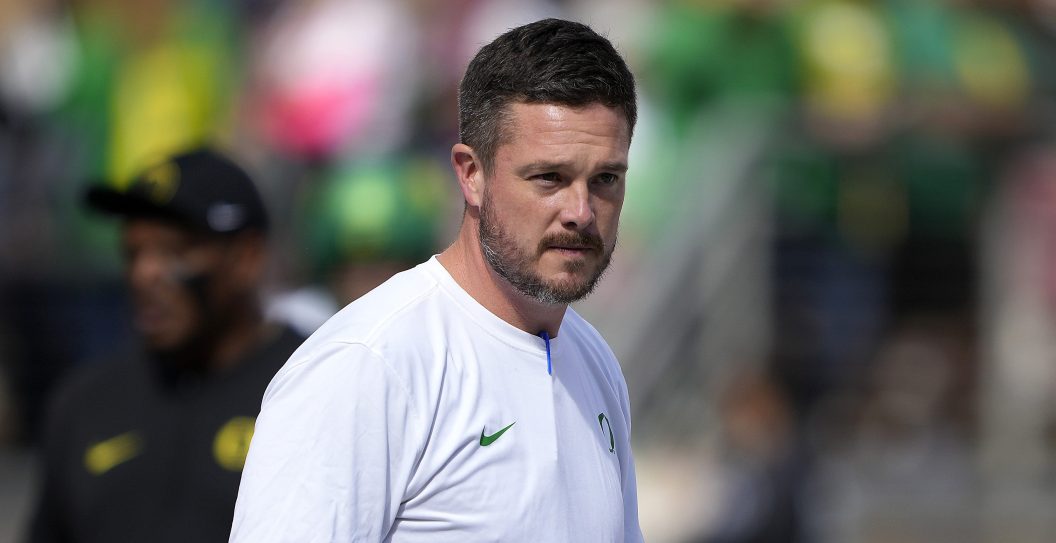 STANFORD, CALIFORNIA - SEPTEMBER 30: Head coach Dan Lanning of the Oregon Ducks looks on while his team warms up prior to playin the Stanford Cardinal in an NCAA football game at Stanford Stadium on September 30, 2023 in Stanford, California.