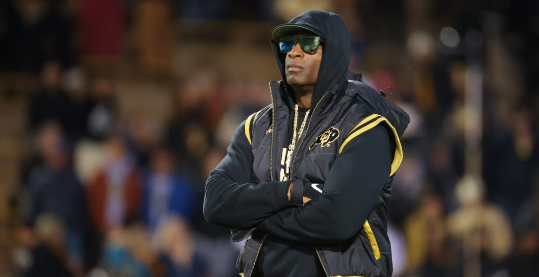 BOULDER, COLORADO - OCTOBER 13: Head coach Deion Sanders of the Colorado Buffaloes watches his team during warm-ups before taking on the Stanford Cardinal at Folsom Field on October 13, 2023 in Boulder, Colorado.