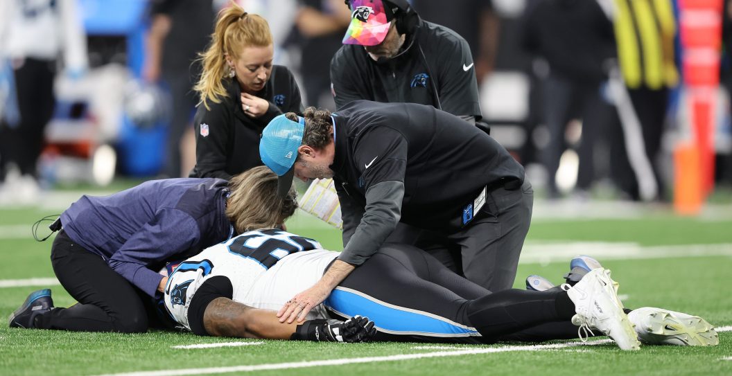 DETROIT, MICHIGAN - OCTOBER 08: Medical personnel attend to Chandler Zavala #62 of the Carolina Panthers after he was injured in the first quarter against the Detroit Lions at Ford Field on October 08, 2023 in Detroit, Michigan.