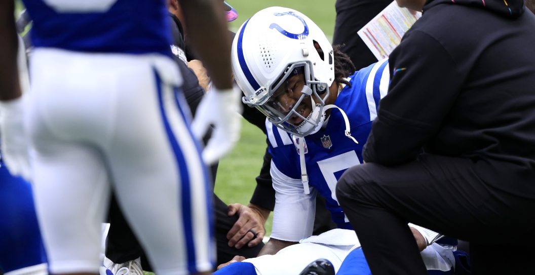 INDIANAPOLIS, INDIANA - OCTOBER 08: Anthony Richardson #5 of the Indianapolis Colts reacts after an injury during the play against the Tennessee Titans during the second quarter at Lucas Oil Stadium on October 08, 2023 in Indianapolis, Indiana.