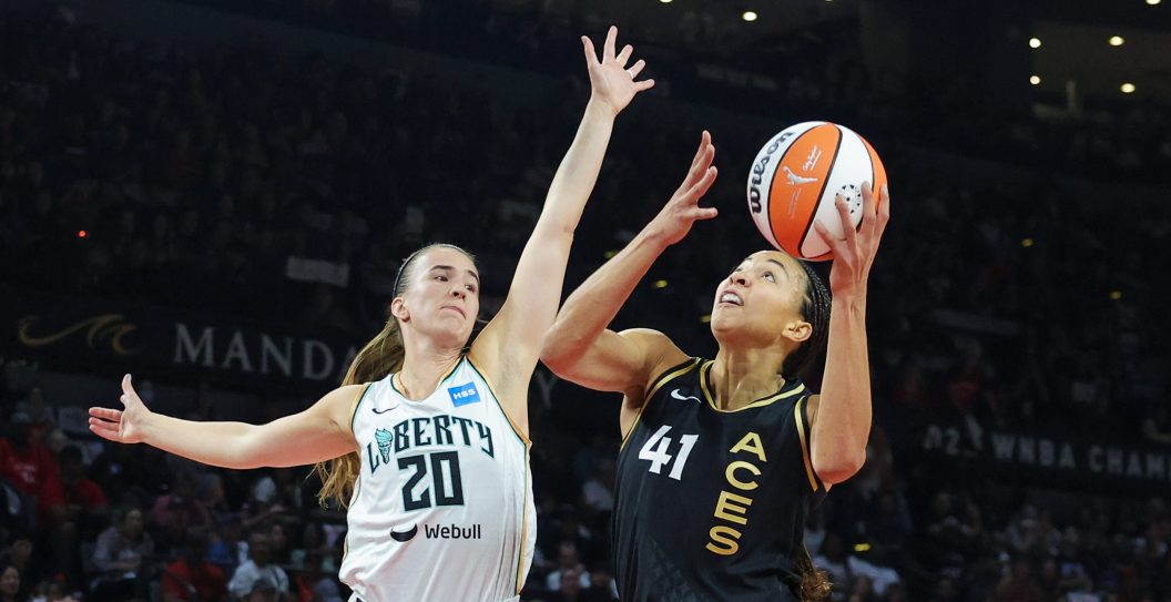 LAS VEGAS, NEVADA - OCTOBER 11: Kiah Stokes #41 of the Las Vegas Aces shoots a layup against Sabrina Ionescu #20 of the New York Liberty in the first quarter of Game Two of the 2023 WNBA Playoffs finals at Michelob ULTRA Arena on October 11, 2023 in Las Vegas, Nevada. The Aces defeated the Liberty 104-76. NOTE TO USER: User expressly acknowledges and agrees that, by downloading and or using this photograph, User is consenting to the terms and conditions of the Getty Images License Agreement.