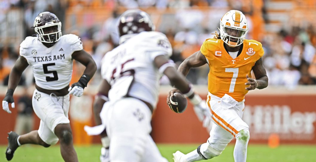 KNOXVILLE, TENNESSEE - OCTOBER 14: Joe Milton III #7 of the Tennessee Volunteers runs the ball against the Texas A&M Aggies in the second quarter at Neyland Stadium on October 14, 2023 in Knoxville, Tennessee.