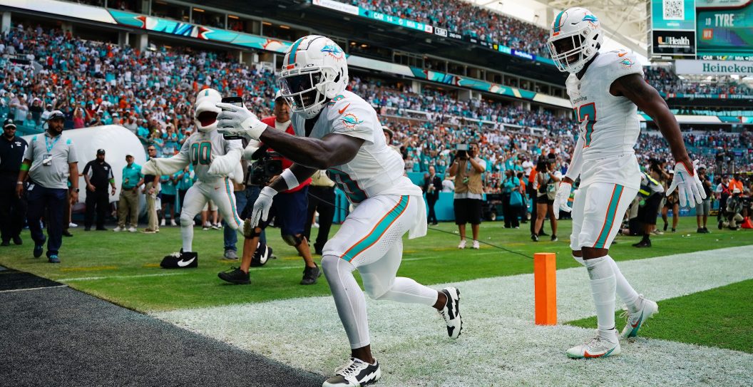 Tyreek Hill #10 of the Miami Dolphins celebrates a touchdown
