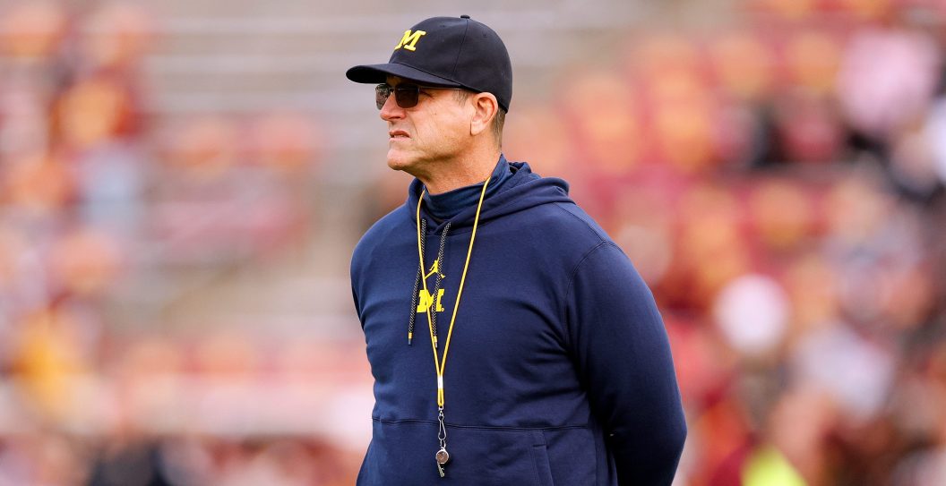 MINNEAPOLIS, MINNESOTA - OCTOBER 07: Head coach Jim Harbaugh of the Michigan Wolverines looks on prior to the start of the game against the Minnesota Golden Gophers at Huntington Bank Stadium on October 07, 2023 in Minneapolis, Minnesota. The Wolverines defeated the Golden Gophers 52-10.