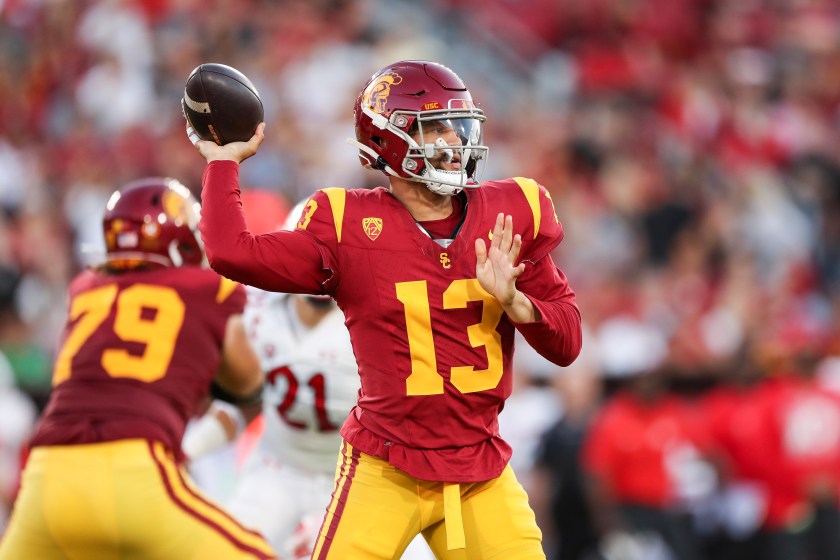LOS ANGELES, CALIFORNIA - OCTOBER 21: Caleb Williams #13 of the USC Trojans throws a pass in the first quarter against the Utah Utes at United Airlines Field at the Los Angeles Memorial Coliseum on October 21, 2023 in Los Angeles, California. 