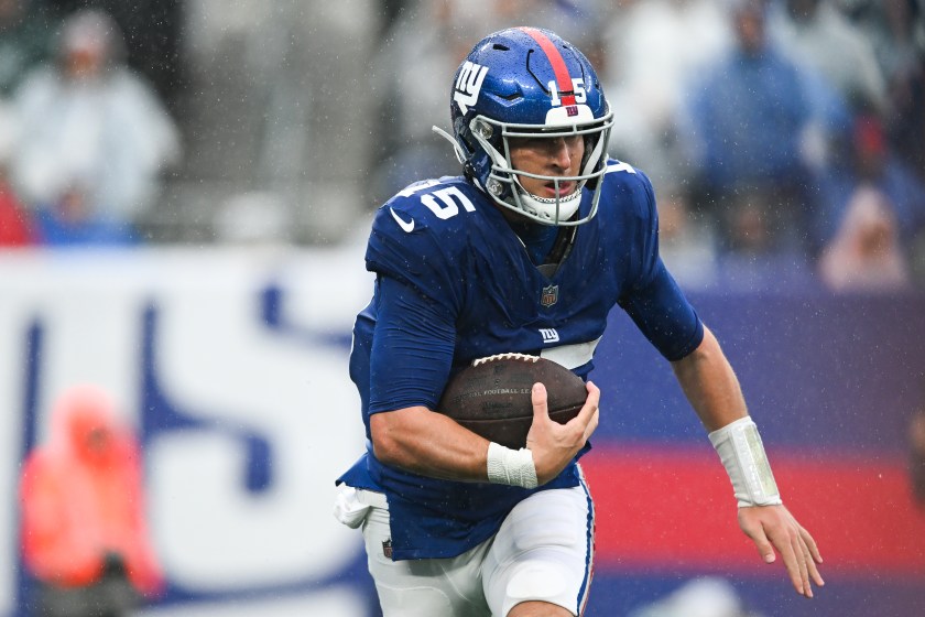 EAST RUTHERFORD, NJ - OCTOBER 29: Tommy DeVito #15 of the New York Giants runs with the football during the second half of the game against the New York Jets at MetLife Stadium on October 29, 2023 in East Rutherford, New Jersey. 