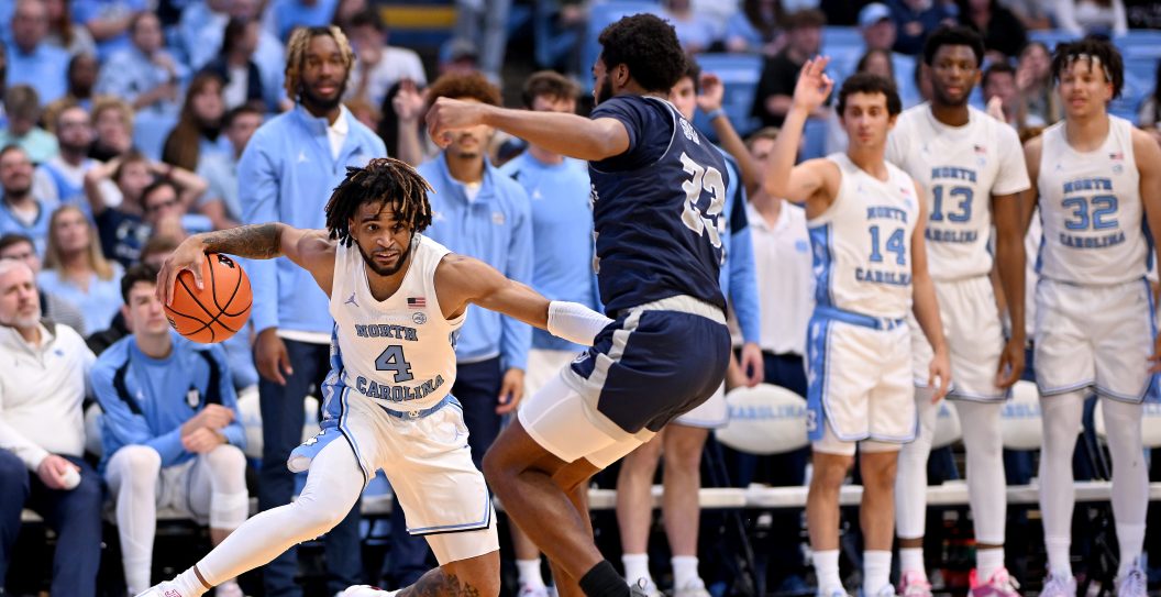 CHAPEL HILL, NORTH CAROLINA - OCTOBER 27: RJ Davis #4 of the North Carolina Tar Heels drives against Jalen Williams #23 of the Saint Augustine Falcons during the second half of their game at the Dean E. Smith Center on October 27, 2023 in Chapel Hill, North Carolina. The Tar Heels won 117-53.