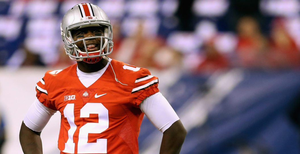 INDIANAPOLIS, IN - DECEMBER 06: Quarterback Cardale Jones #12 of the Ohio State Buckeyes smiles on the field during warm ups before playing against the Wisconsin Badgers in the Big Ten Championship at Lucas Oil Stadium on December 6, 2014 in Indianapolis, Indiana.