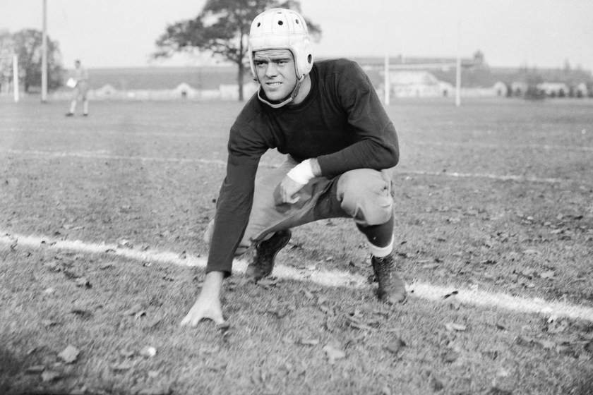 Larry Kelley as the star tight end and forward pass receiver for the Yale Football team. In 1936, he was elected captain of the Yale University football team and won the Heisman Trophy.