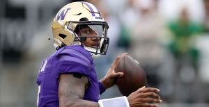 Michael Penix Jr. throws a pass for Washington.