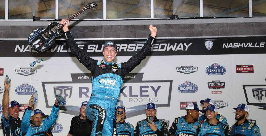LEBANON, TENNESSEE - JUNE 23: Carson Hocevar, driver of the #42 Worldwide Express Chevrolet, celebrates in victory lane after winning the NASCAR Craftsman Truck Series Rackley Roofing 200 at Nashville Superspeedway on June 23, 2023 in Lebanon, Tennessee.