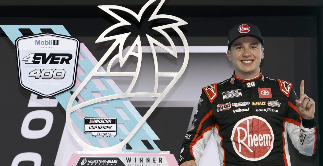 HOMESTEAD, FLORIDA - OCTOBER 22: Christopher Bell, driver of the #20 Rheem/Watts Toyota, celebrates in victory lane after winning the NASCAR Cup Series 4EVER 400 Presented by Mobil 1 at Homestead-Miami Speedway on October 22, 2023 in Homestead, Florida.