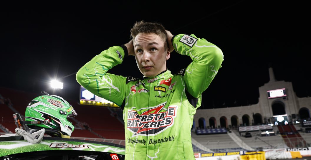 LOS ANGELES, CALIFORNIA - FEBRUARY 04: Christopher Bell, driver of the #20 Interstate Batteries Toyota, reacts during qualifying for the NASCAR Clash at the Coliseum at Los Angeles Coliseum on February 04, 2023 in Los Angeles, California.